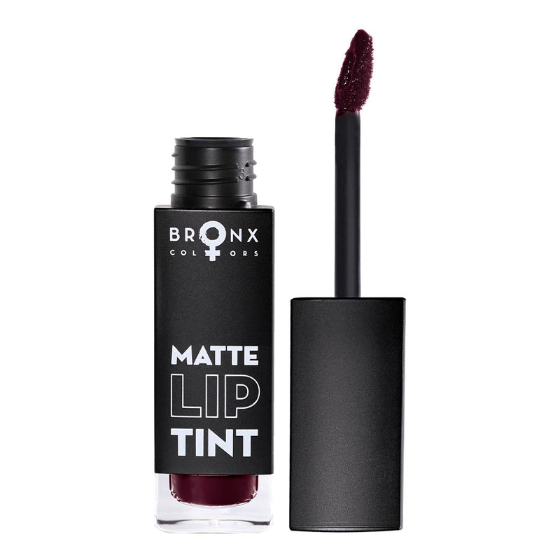 Matte Lip Tint in Dark Mauve shade with applicator, offering bold color and creamy moisture in a velvet finish.