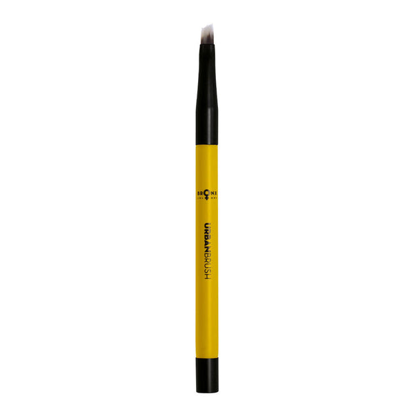 Magnetic angled brush with soft bristles for eyebrows and eyeliner.