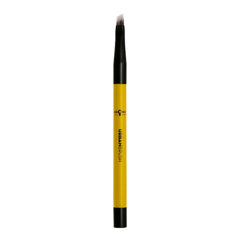 Magnetic angled brush with soft bristles for eyebrows and eyeliner.